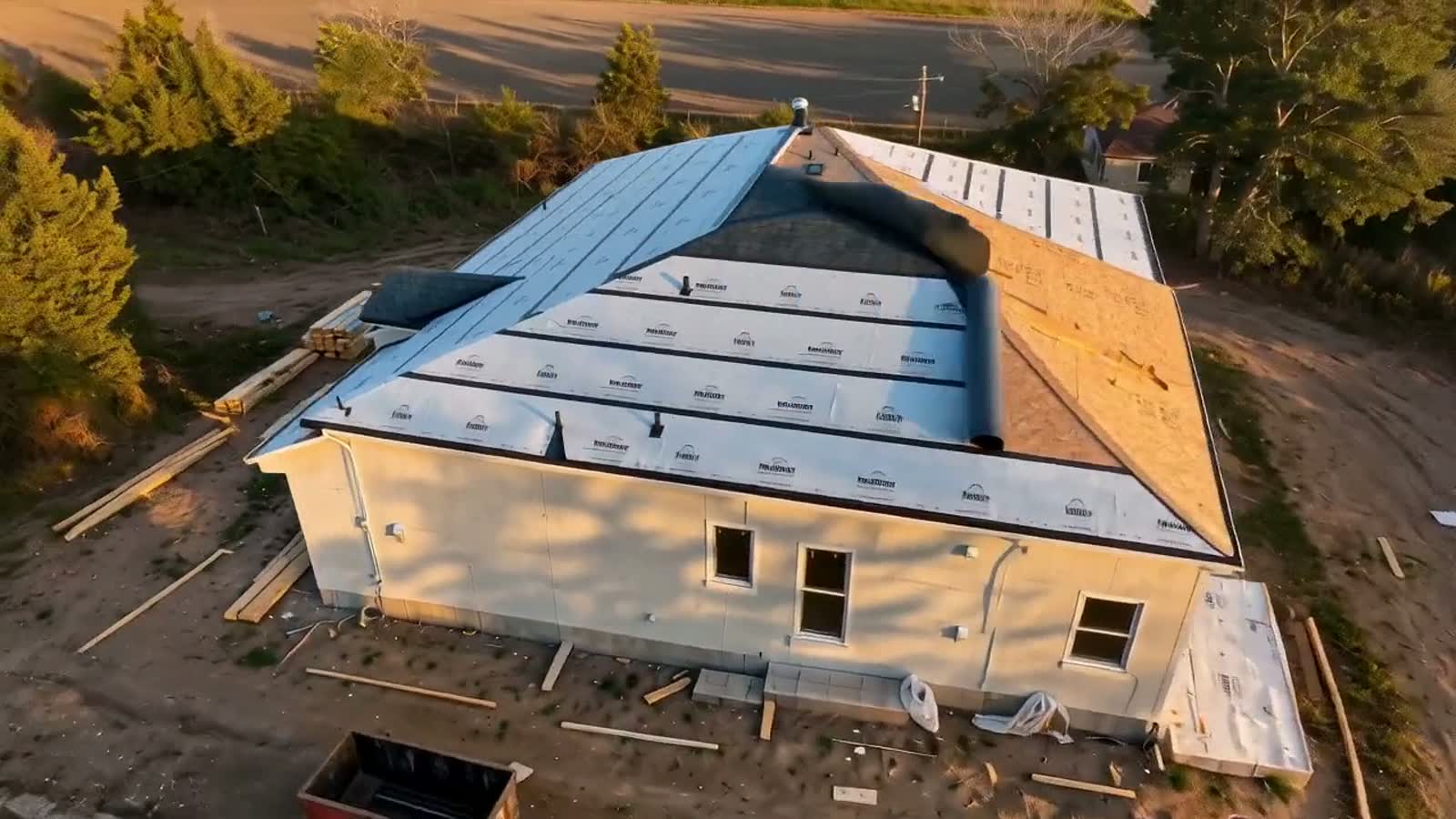 Aerial view of a Texas home mid-roof-replacement