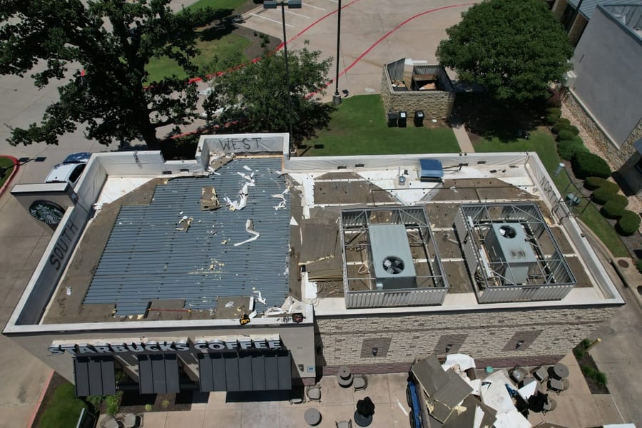 Low-slope commercial roof system installed by Select Roofing