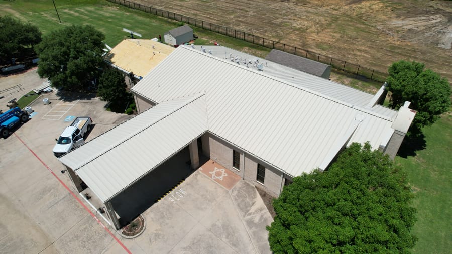 Standing seam metal roof installed by Select Roofing