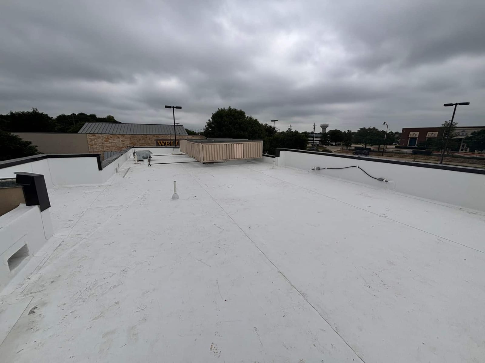 Completed commercial roofing project by Select Roofing